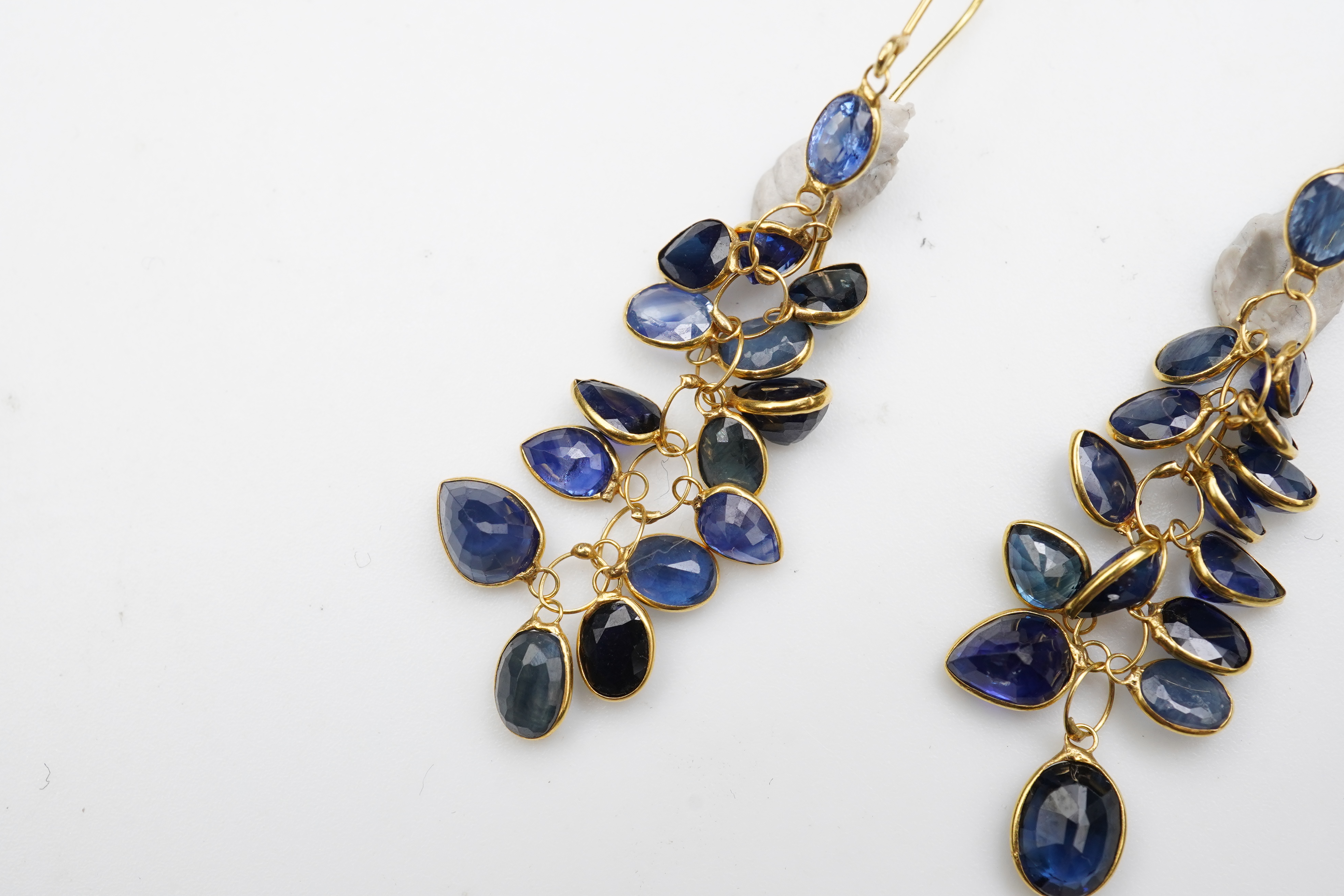 A pair of sapphire pendent earrings
